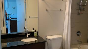 Hair dryer, towels, soap, toilet paper