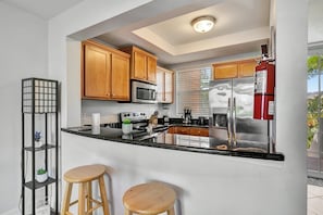 Classic Townhome, 2 Bedrooms, Balcony | Private kitchen | Full-size fridge, microwave, oven, stovetop