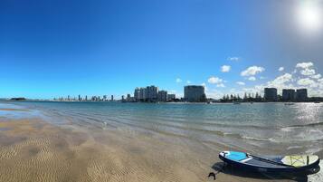 On the beach, sun-loungers, beach towels