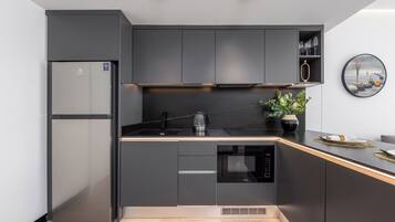 Comfort Suite, Balcony, Resort View | Private kitchen