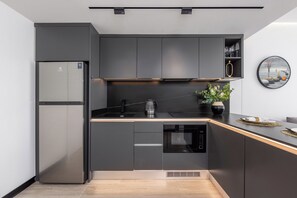 Comfort Suite, Balcony, Resort View | Private kitchen