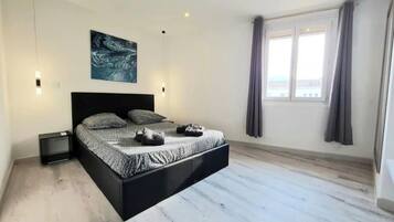 2 chambres, fer et planche Ă repasser, Wi-Fi, draps fournis