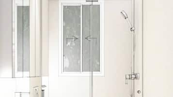 Secadora de cabello, toallas, jabón, papel de baño