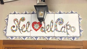 A wall sign with the text 'Sel del Capo' and a decorative border. - Nel Cuore del Capo  (Palermo)