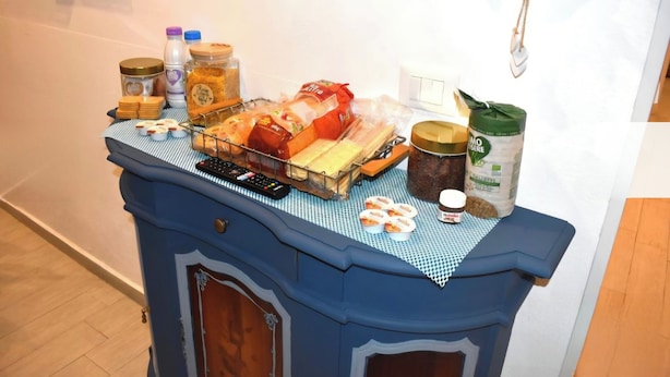 A buffet table with various food items and condiments. - Nel Cuore del Capo  (Palermo)
