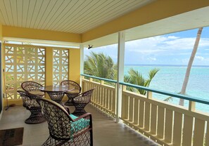 Outdoor dining - SUITE SUNSHINE at Colony Cove-2 bed/2 bath TROPICAL BEACHFRONT condo w/pool (Christiansted, St. Croix)