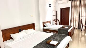 Family Triple Room | Iron/ironing board (on request), bed sheets