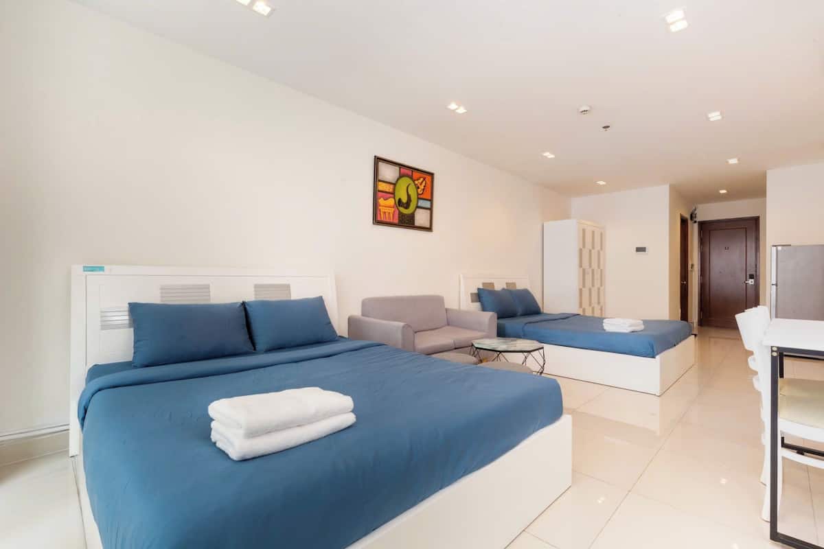 Standard Apartment, Multiple Beds, Kitchen, Pool View | Free minibar, desk, laptop workspace, blackout drapes