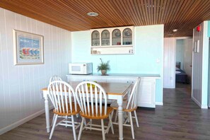 Dining - Cute, spacious 1-bedroom oceanfront condo with free WiFi, an outdoor pool, and an expansive balcony located midtown! (Ocean City)