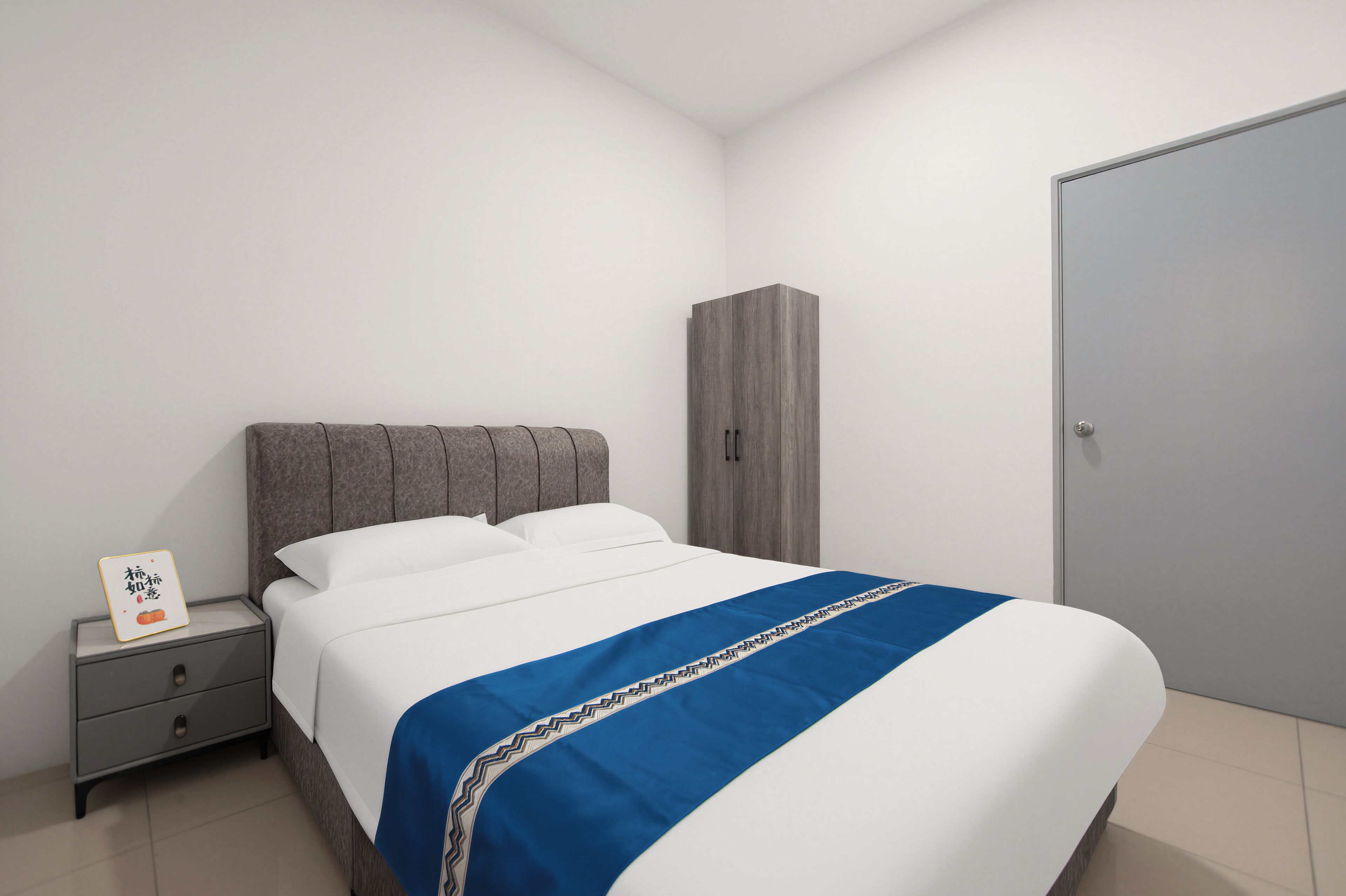 A bedroom with a bed, a nightstand, a wardrobe, and a door.