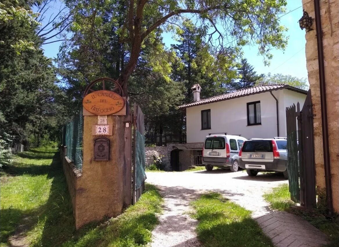 The entrance with parking area