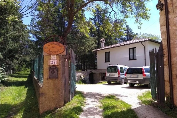 The entrance with parking area
