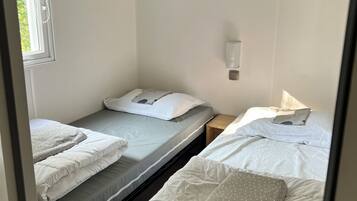 3 habitaciones y ropa de cama
