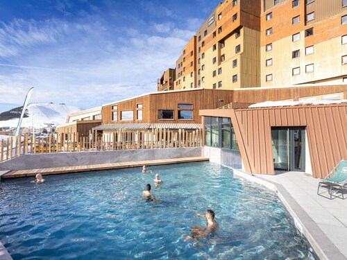 Living for Three in the Heart of Huez