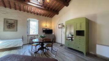 Suite Confort, vue jardin | Restauration