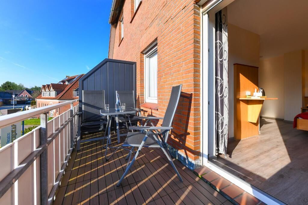 Tweepersoonskamer, balkon | Buiten dineren