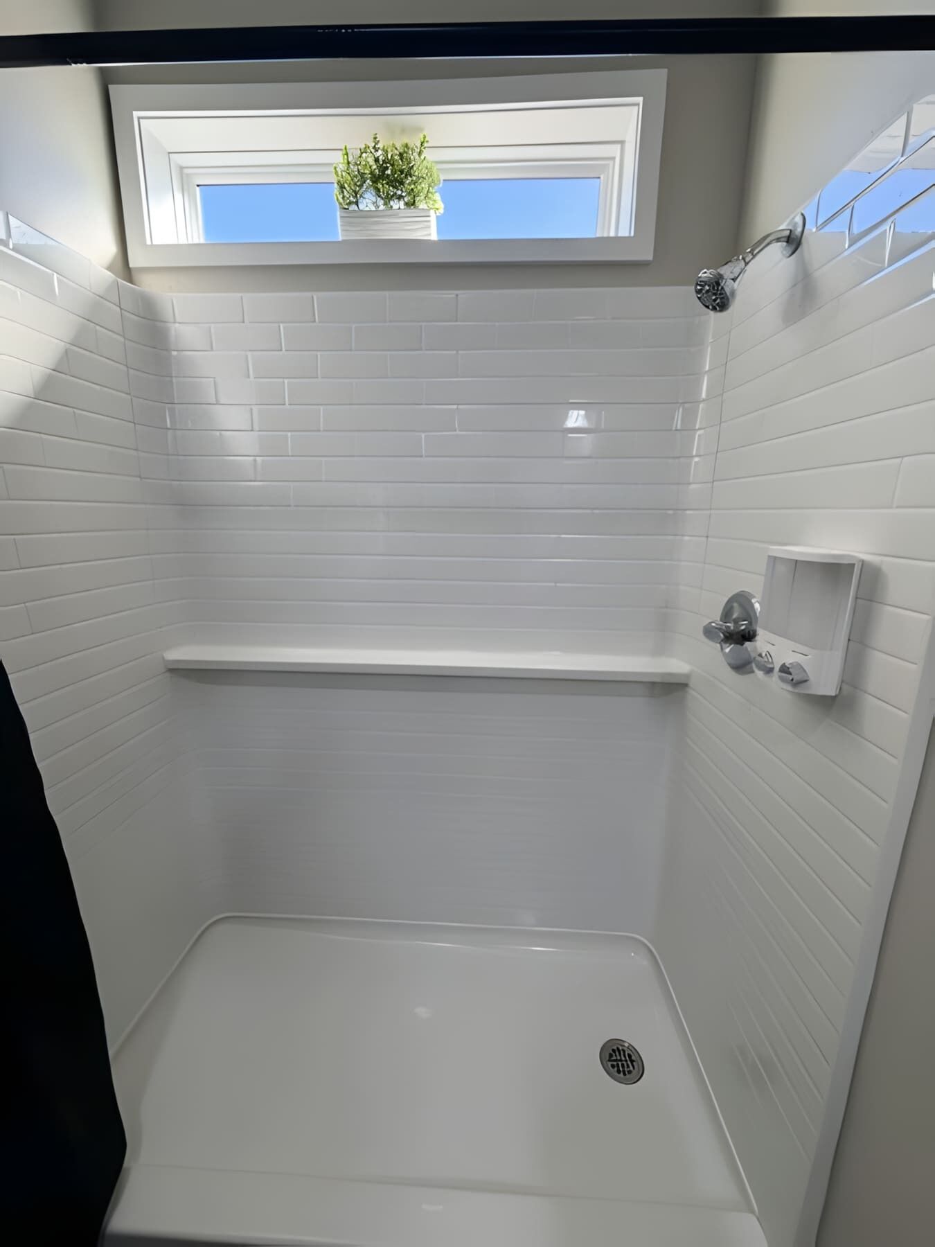 Shower, hair dryer, towels, shampoo
