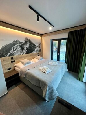 Superior Apartment, Balcony, Mountain View | Memory foam beds, cribs/infant beds, free WiFi, bed sheets - Apartmány Capra (Demanovska Dolina)