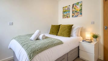 1 bedroom, desk, iron/ironing board, travel cot