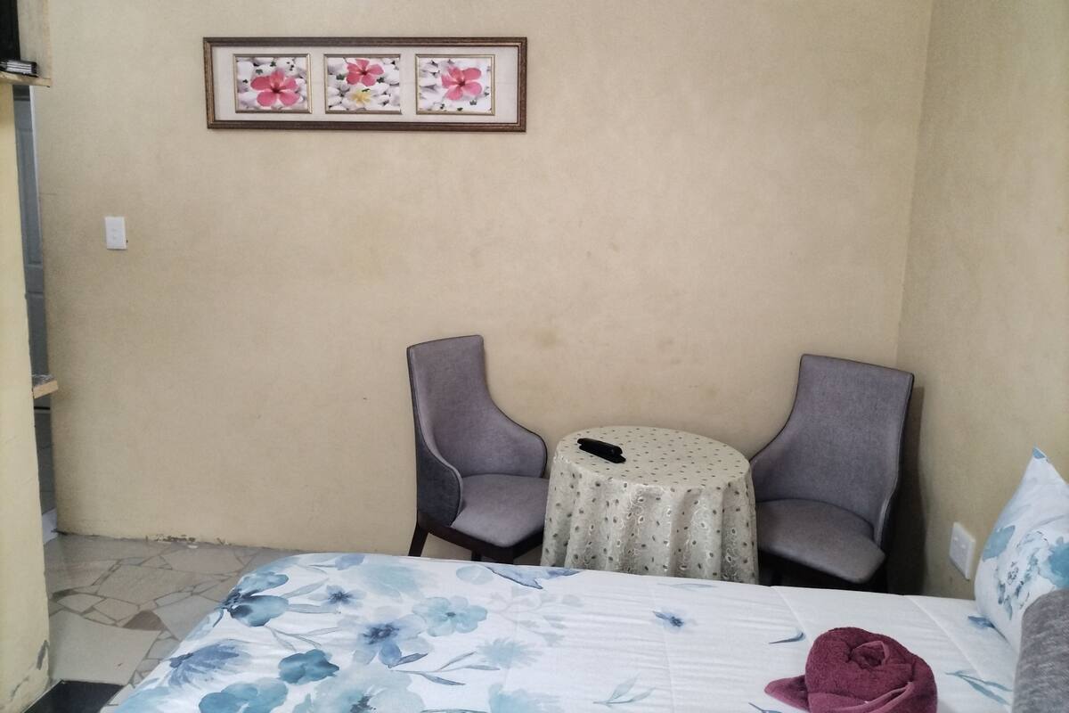 Deluxe Double or Twin Room, Mountain View | Living area | TV