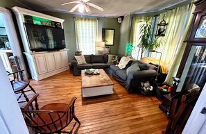 Living area - Walking distance to downtown, 3-bedroom vintage cottage w/breezy front porch (Camden)