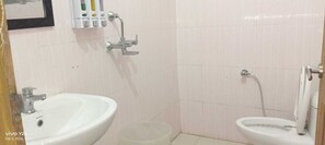 Shower, slippers, towels, soap