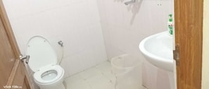 Shower, slippers, towels, soap