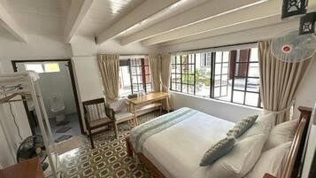 Deluxe Double Room, Courtyard View | Desk, iron/ironing board, free WiFi