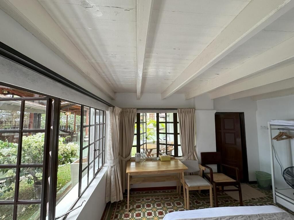 Deluxe Double Room, Patio, City View | Dining