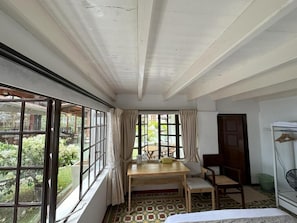 Deluxe Double Room, Patio, City View | Dining
