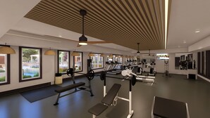 A modern gym with treadmills, weight machines, and benches. - Landing | Stunning 1BD, Clubhouse, Gym (Little Rock)
