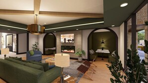 A modern living room with a sofa, a coffee table, a fireplace, and a television. - Landing | Stunning 1BD, Clubhouse, Gym (Little Rock)