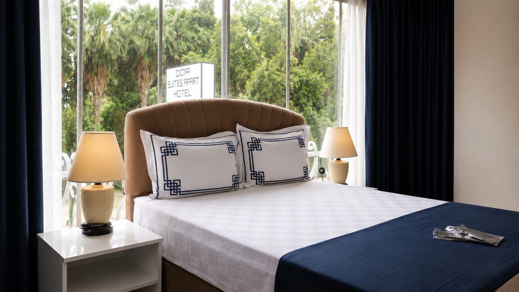 Deluxe Studio | In-room safe, blackout drapes, iron/ironing board
