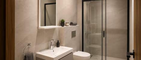 Grand Suite | Bathroom | Hair dryer, slippers, towels, soap