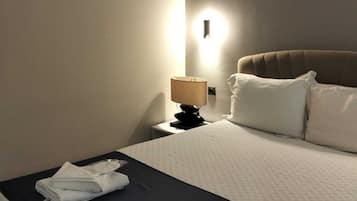Grand Suite | In-room safe, blackout drapes, iron/ironing board