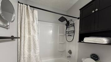 Hair dryer, towels, soap, toilet paper