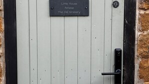 A door with a sign reading 'Little House Annex The Old Granary.' - The Little House Annex – A Peaceful Countryside Stay in Beautiful Shotteswell. (Shotteswell)