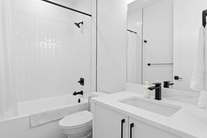 Hair dryer, towels, soap, toilet paper - Modern Luxury Home | 3 Min to University, Stadium & Major Hospitals (Calgary)