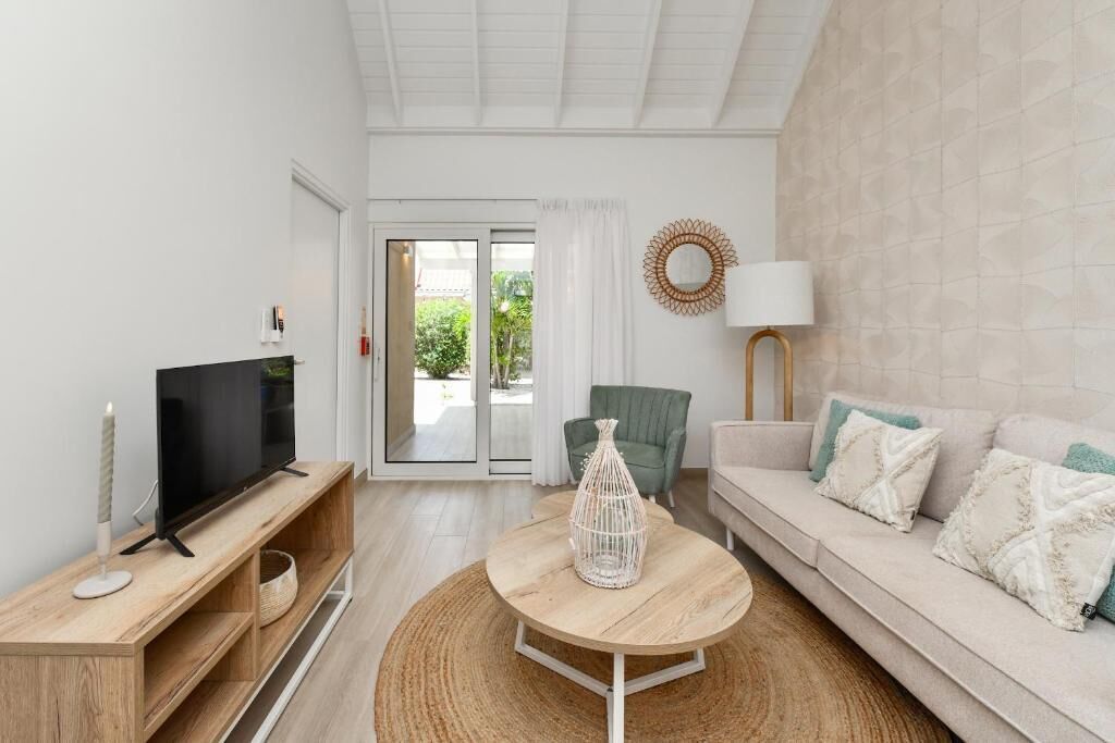 Comfort Apartment, Garden View | Living area