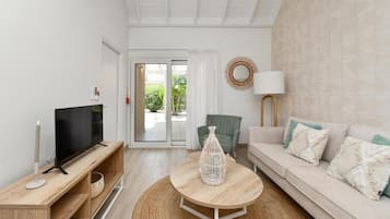 Comfort Apartment, Garden View | Living area