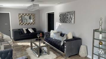 Smart TV, fireplace, DVD player, books