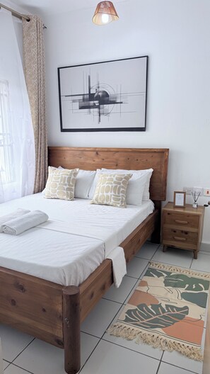 1 habitación, tabla de planchar con plancha, wifi gratis y ropa de cama 