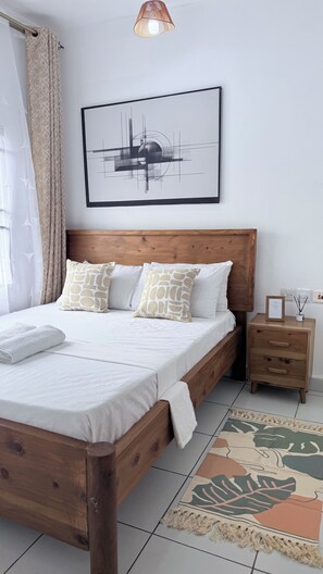 1 habitación, tabla de planchar con plancha, wifi gratis y ropa de cama 