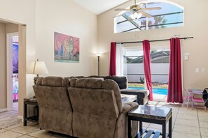 House, 5 Bedrooms, Private Pool, Lakeside | Living area | 55-inch Smart TV with digital channels, Netflix, Hulu - 5BR Villa Private Pool & Game Room (Kissimmee)