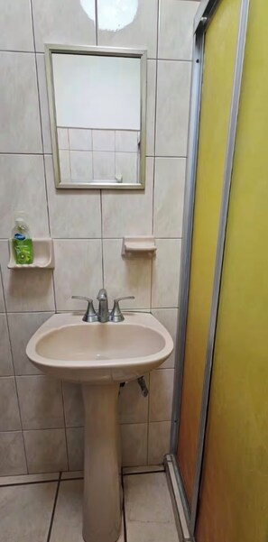 Shower, towels, soap, toilet paper