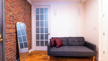 Suite, 3 chambres, cuisine | Aire de séjour