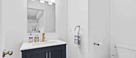 Shower, towels, soap, toilet paper