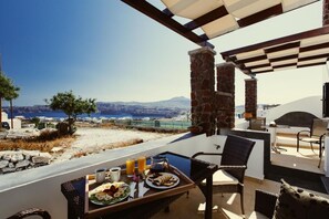 Outdoor dining - Aelia Suites, Akrotiri, Santorini - Aegean Suite, Caldera Sea View (Fira)