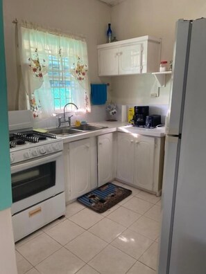 Standard Apartment | Private kitchen - Ocean Sky Apartments  (Oistins)