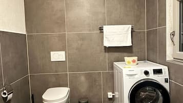 Een douche, een bubbelbad, een haardroger